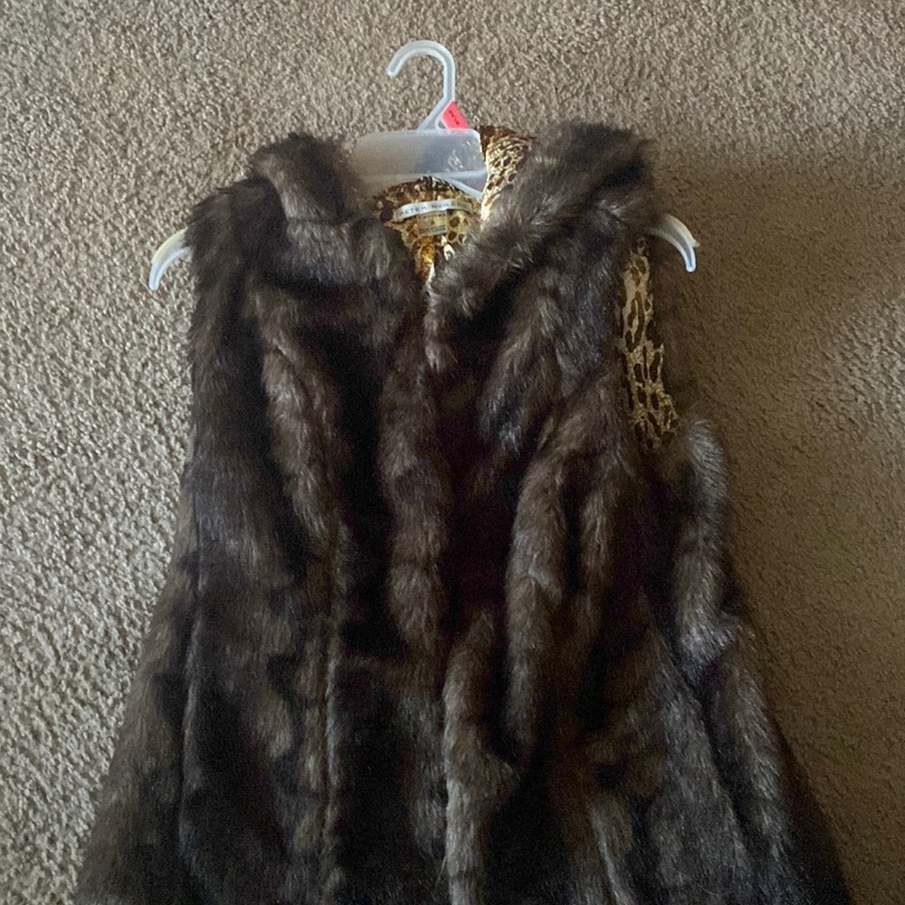 Fur Hooded Vest ! Very high end! Great price worn once. Non smoker